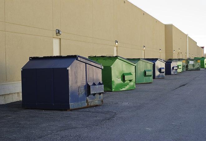 brightly colored dumpsters filled with construction waste in Apollo Beach